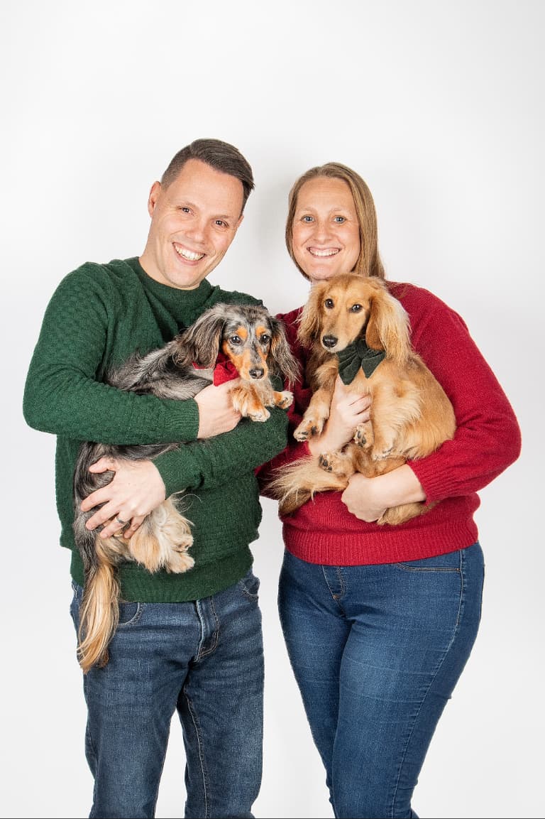 Alex and Jo Sloat with their dachshunds Storm and Fox